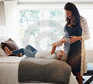 Home bed, pregnant woman and child touch stomach, abdomen and happiness for moving baby check. Expectation, maternity