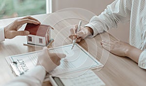 Home broker or salesperson allows customers to sign a contract to purchase a home as a legitimate homeowner