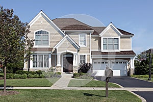 Home with brown cedar roof