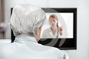 In-home care for an elderly patient with telemedicine or telehealth, virtual live chat photo