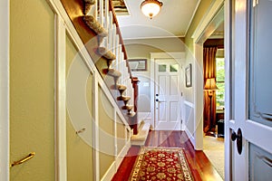 Home classsic decor hallway with entrance front door.