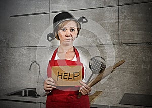 Home cook woman confused and frustrated in apron and cooking pot as helmet asking for help