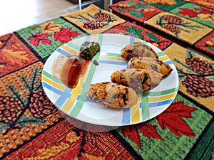 Home cooked Indian fried snack Pakoda served with chutney