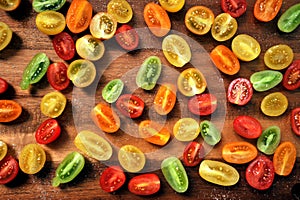 Home cooking from scratch concept with tomatoes on a wooden board