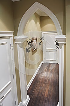 Home corridor with decorative metal details.