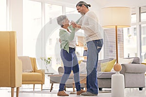 Home, dancing and a happy mature couple on anniversary, birthday or valentines day celebration. Holding hands, love or