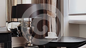 Home decor and interior design, luxury lamp and coffee table in elegant classic styled room, furniture and decoration