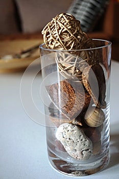 Home decoration in a glass: wooden, mineral elements