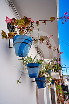 Home decorations along the beautiful promenade of Estepona on a clear sunny day, Andalusia