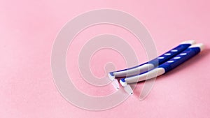 Home Dental Cleaning Small Brush for Dental Hygiene Dental Care Teeth Cleaning Tool Interdental Brush on Pink Copy Space