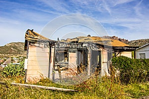 Home Destroyed By Fire With Caved In Roof