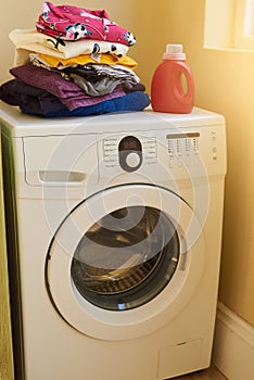 Home, detergent and washing machine for clothes, laundry room for housework and cleaning fabric. Electric device