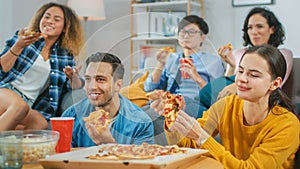 At Home Diverse Group Friends Watching TV Together, They Share Gigantic Pizza, Eating Tasty Pie Pi
