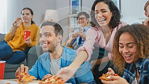 At Home Diverse Group Friends Watching TV Together, They Share Gigantic Pizza, Eating Tasty Pie Pi