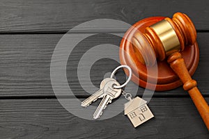 Home after divorce. Property section. Judge gavel and house keys. Buying or selling a home through auction