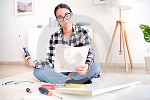 Home DIY renovation concept. Woman works to create something new and beautiful for her home