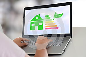 Home energy efficiency concept on a laptop