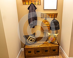 Home Entryway With Coat Racks & Wooden Chest