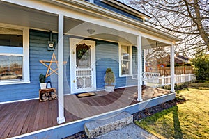 Home exterior with Classic Northwest Charm features blue siding