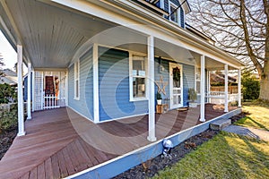 Home exterior with wrap around front porch.