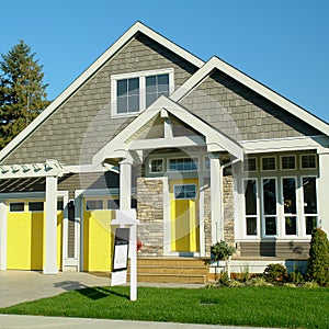 Home Exterior With Yellow Doors