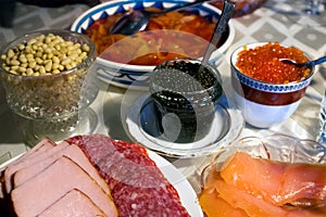 Home festive served table with red and black caviar