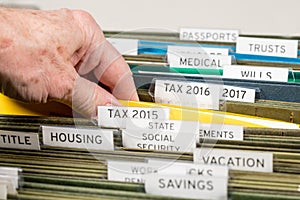 Home filing system for taxes organized in folders