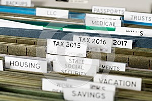 Home filing system for taxes organized in folders