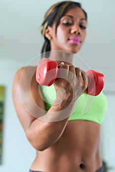 Home Fitness Black Woman Training Biceps With Weights