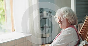 Home, funny and elderly woman with retirement, thinking and happy with memory, ideas and nostalgia. Pensioner, apartment