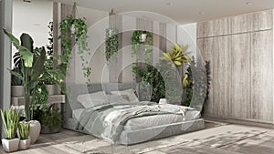 Home garden, minimal bedroom in beige and bleached wooden tones. Velvet double bed, parquet floor and many houseplants. Urban