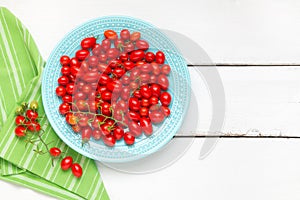 Home grown cherry and grape tomatoes on plate