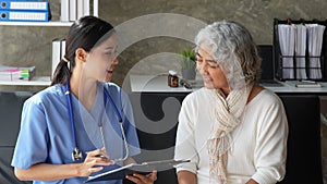 Home healthcare nurse, physical therapy with senior adult woman at home