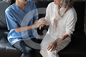 Home healthcare nurse, physical therapy with senior adult woman at home