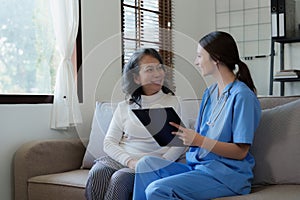 Home healthcare nurse, physical therapy with senior adult woman at home