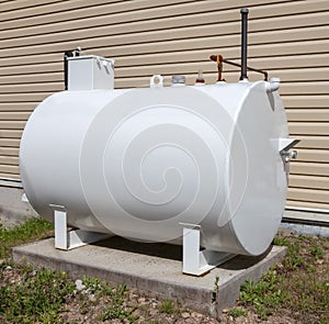 Home heating oil tank on concrete slab