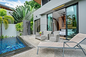 Home or house building Exterior and interior design showing tropical pool villa with green garden