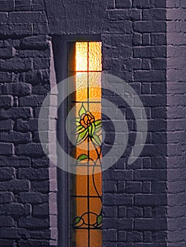 home house leaded lights window stained glass flowers roses glow orange lighting panels