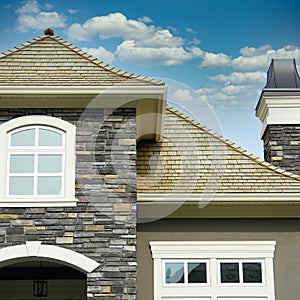 Home House Stucco Shake Roofing Details Summer Cumulus Sky Background