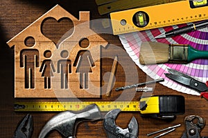 Home Improvement Concept - Work Tools and House photo