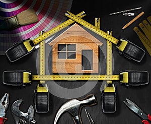 Home Improvement Concept - Work Tools and House