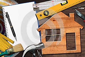 Home Improvement Concept - Work Tools and House