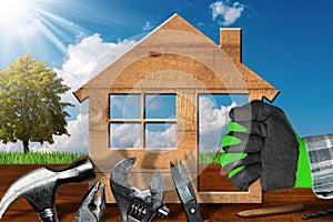 Home Improvement Concept - Work Tools and House