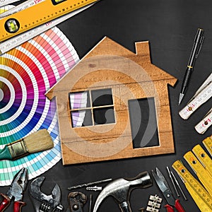 Home Improvement Concept - Work Tools and House