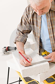 Home improvement - handyman measure porous brick