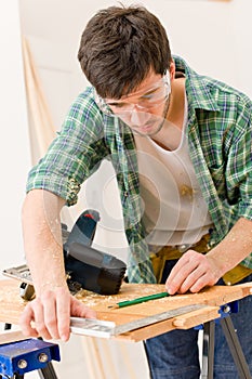 Home improvement - handyman prepare wooden floor