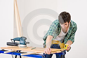 Home improvement - handyman prepare wooden floor