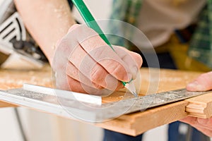 Home improvement - handyman prepare wooden floor photo