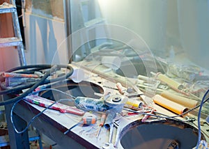 Home improvement messy clutter with dusted tools photo