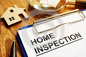 Home inspection form with clipboard.